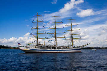 Fototapeta na wymiar A white frigate on Neva river