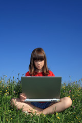 Girl with laptop outdoor