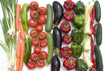 Vegetables lineup on white background