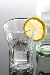 Wellness drink and lemon