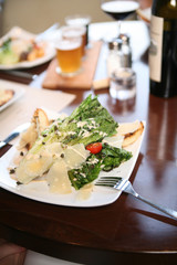 Appetizer salad with shaved parmesan cheese