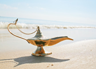 Genies lamp on seashore