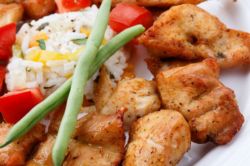 Grilled meat with rice and vegetables