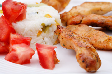 Grilled meat with rice and vegetables