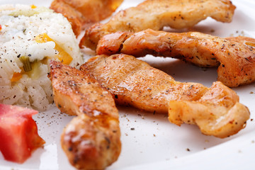 Grilled meat with rice and vegetables