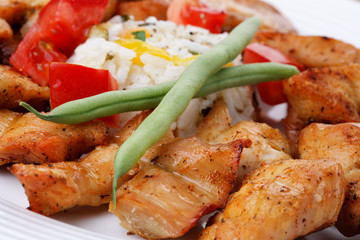 Grilled meat with rice and vegetables