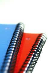 Blue and red notebooks
