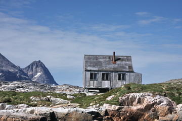 Abandoned village on a small island in Greenland