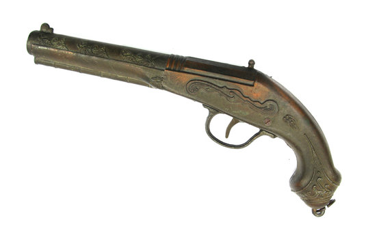 Old flint rifle pistol isolated on white background