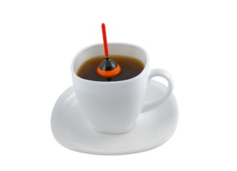 Fishing float inside cup of coffee