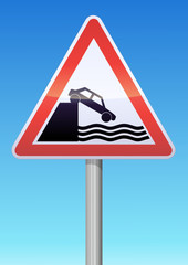 Panneau de danger d&eacute;bouch&eacute; sur un quai ou une berge