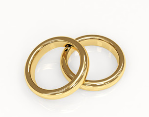 Two 3d gold wedding ring. Objects over white