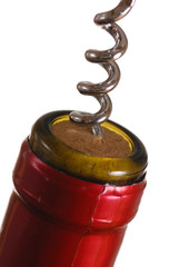 Opening a wine bottle with corkscrew, isolated on white