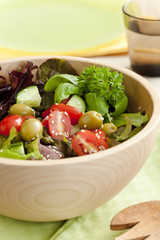 Fresh salad made from lettuce, tomotaoes, cucumber