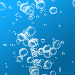 Fototapeta na wymiar Rising air bubbles on a blue background