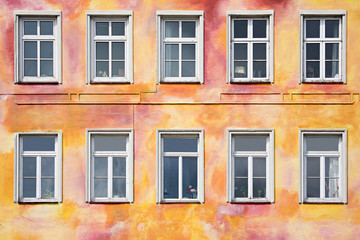 Obraz premium colorful old apartment front