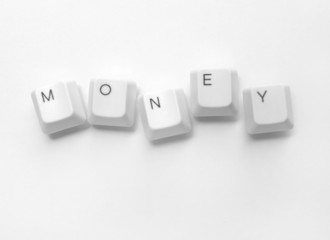 Close up of computer keys with money word