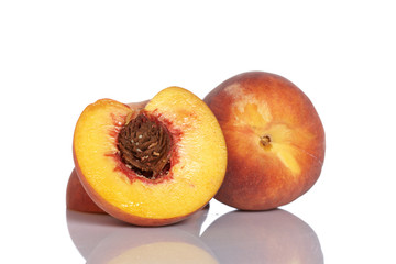 Peach fruit over on white background. Shallow depth of field