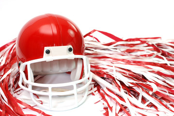 Red football helmet and pom poms isolated on white background. - 8799251