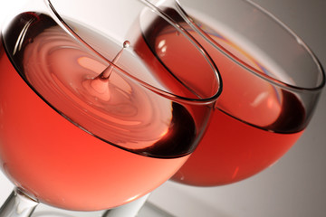 two glasses of rose wine with droplet