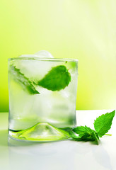 mojito cocktail with ice and fresh mint