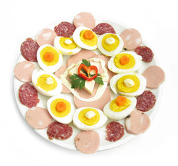 Cold dish with eggs, mayonnaise, carrots and dried meat