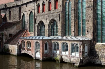 Wall murals Channel House detail along a canal in Bruges