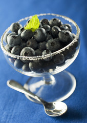fresh blue berries in glass close up