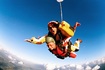 Tandem skydiver in action parachuting