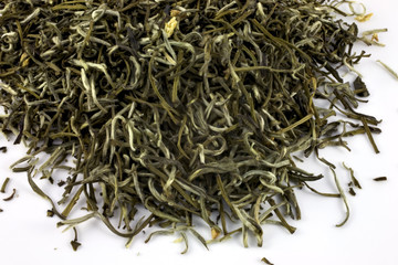 Nosy chinese green tea leaves on table