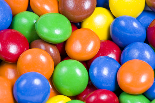 Close Up of Assortment of Colorful Chocolate Candy Background