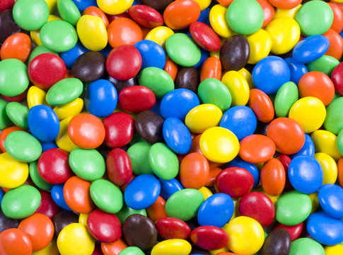 Naklejki Assortment of Colorful Chocolate Candy Usable as Background