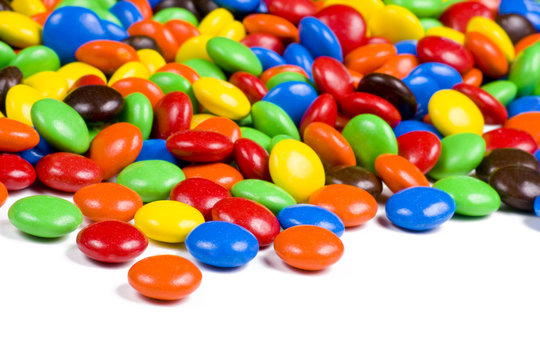 Assortment Of Colorful Chocolate Candies On White Background