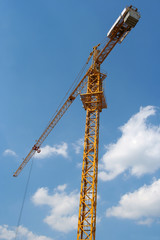 Crane on the blue sky