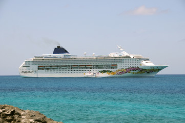Modern ocean liner visiting an island in the Caribbean
