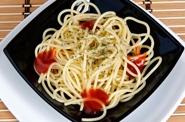 Freshly cooked plate of spaghetti with tomato sauce