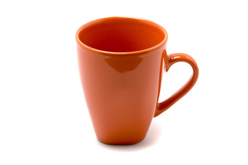 Red mug on white background with shadow