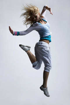 stylish and cool looking breakdancer jumping