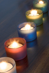 Fototapeta na wymiar a set of 5 tea light candles