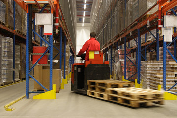 forkift operator in warehouse