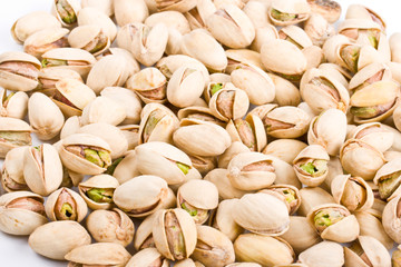 Pile of pistachio nuts close up