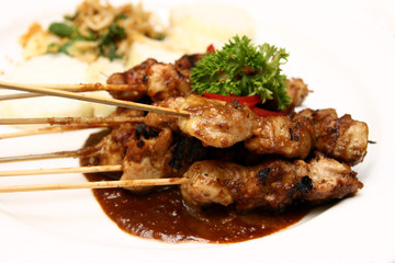 Close-up of delicious Indonesian chicken satay.