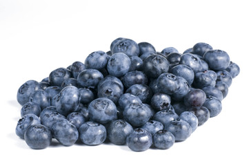 Blueberries in a group on white background