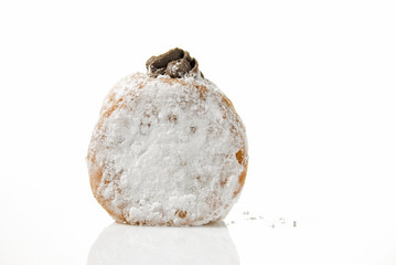 A temptingly delicious piece of strawberry-filled donut