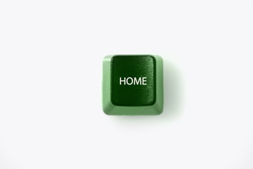 HOME computer key shot against white