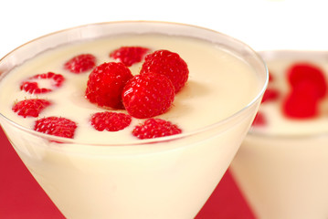 Delicious vanilla almond mousse with fresh raspberries