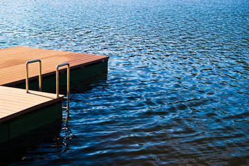 pontoon with ladder on lake
