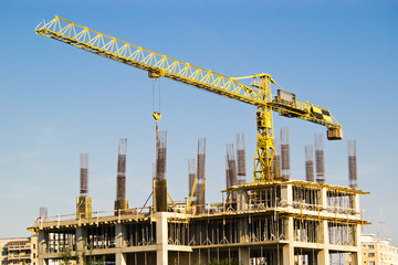 crane and construction site of city building