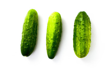 An image of three cucumbers on white background