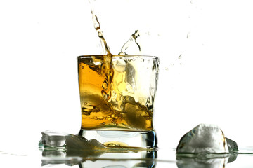 whisky splash alcohol drops isolated on white